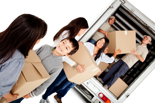 House removal team planning a move in a French city apartment area