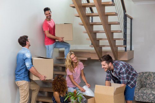 Local moving team preparing packing and unpacking work in France