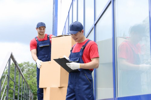 Man with van removal service helping with a small apartment move in France