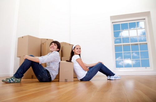 Business furniture and packed office items ready for transport in France