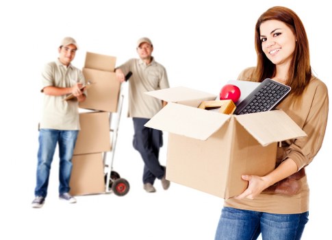 Unpacking boxes and arranging items in a new French home