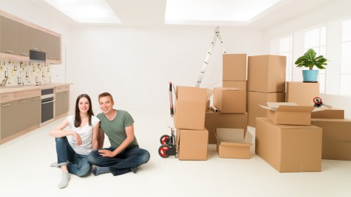 Packed moving boxes and furniture prepared for removals in France