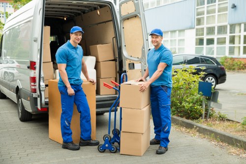 Packed boxes and household items secured inside a moving truck