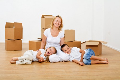 Moving crew loading boxes and furniture for a relocation in France