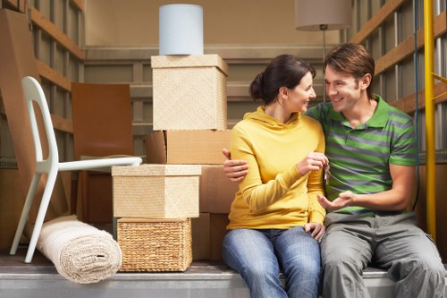 Packed office boxes and dismantled furniture ready for a business relocation