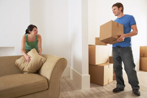 Loading boxes and household items into a van in France